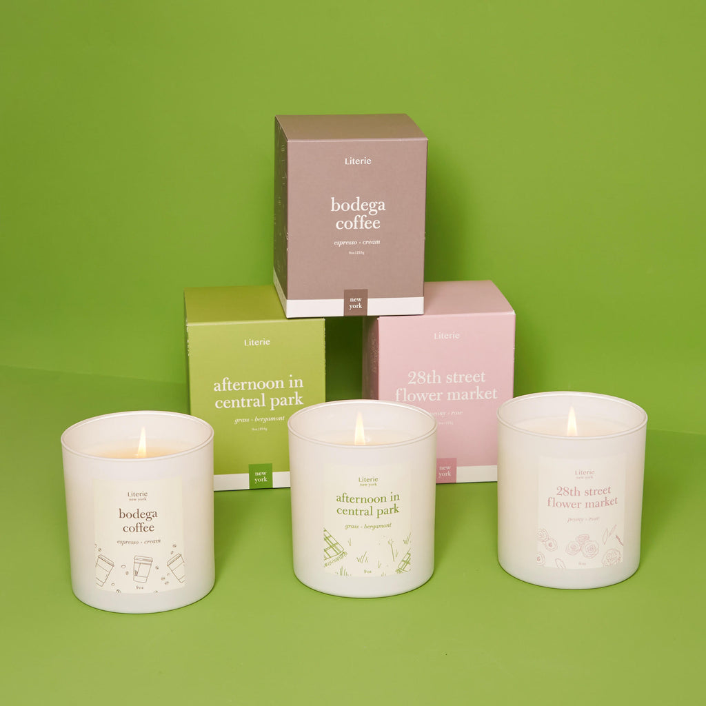 Three candles on a green background