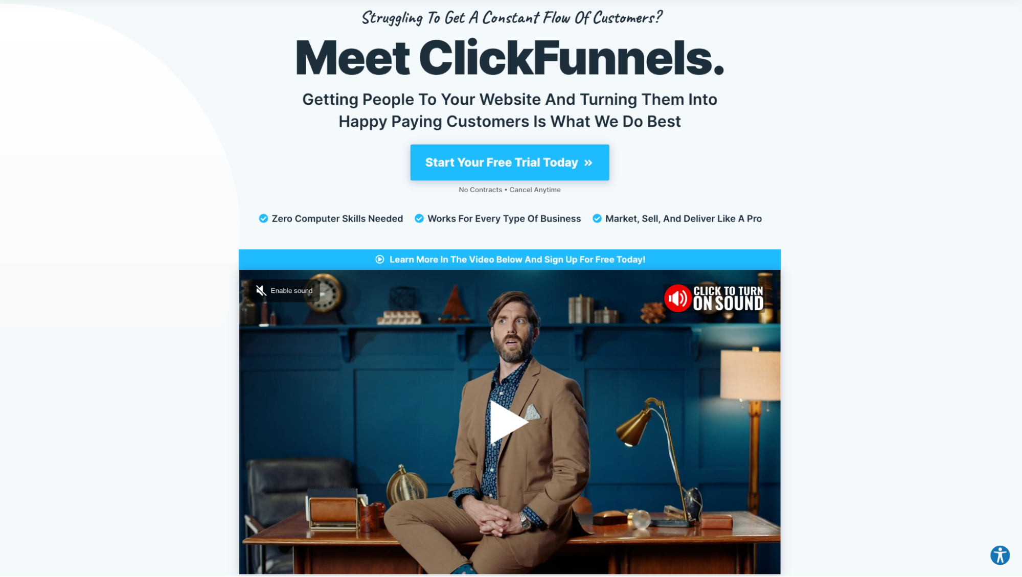 ClickFunnels website with a video thumbnail of a man sitting on a desk.