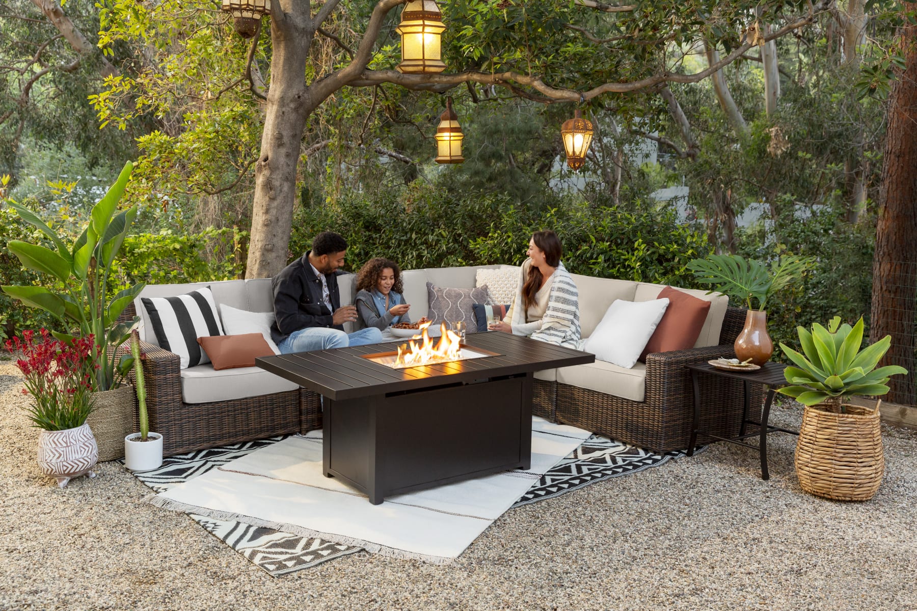 An outdoor patio set in a backyard setting
