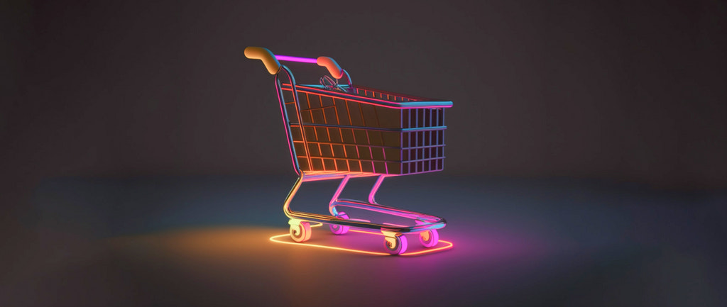 neon light grocery store shopping cart on a black background