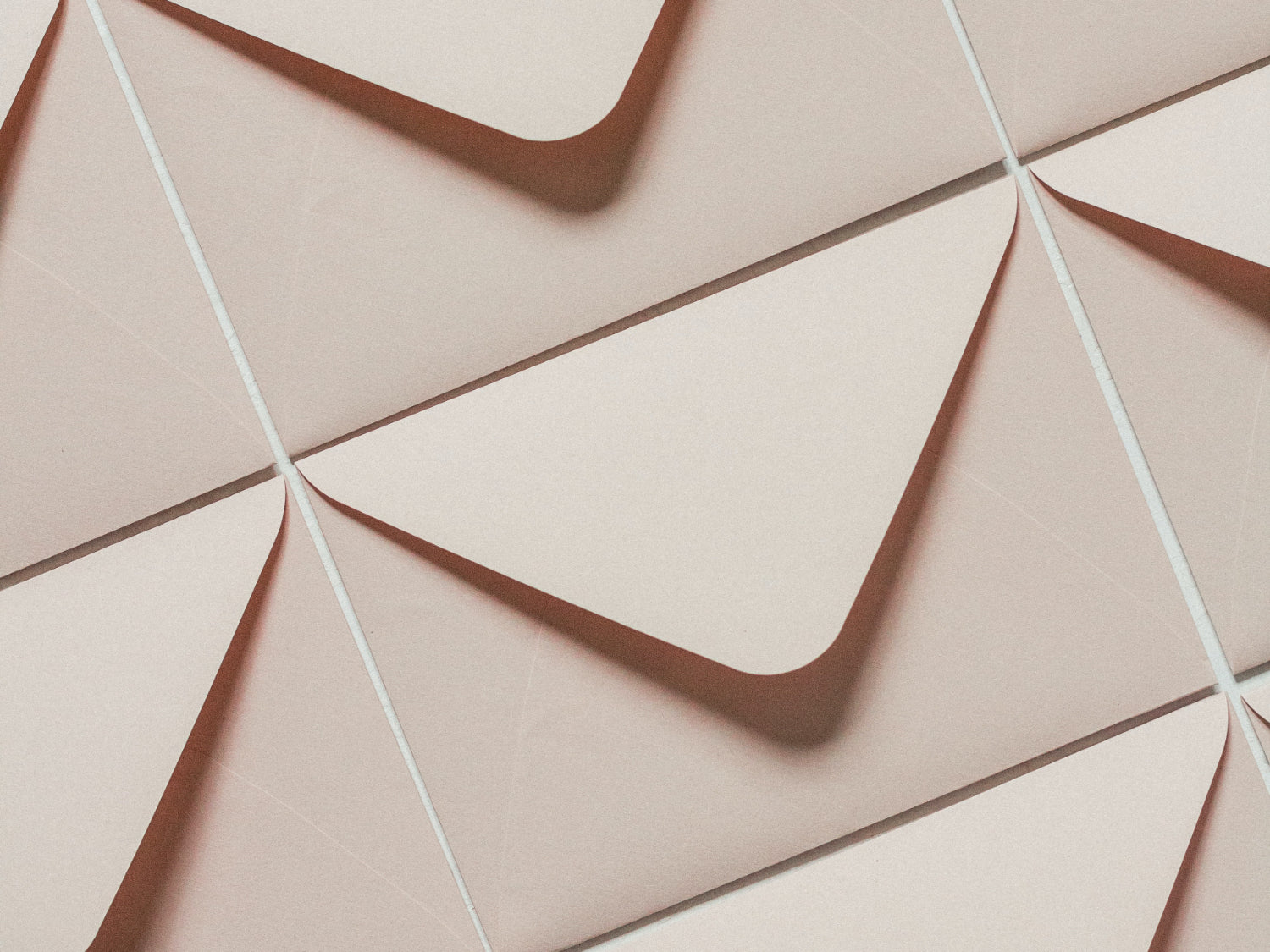 Beige envelopes arranged neatly