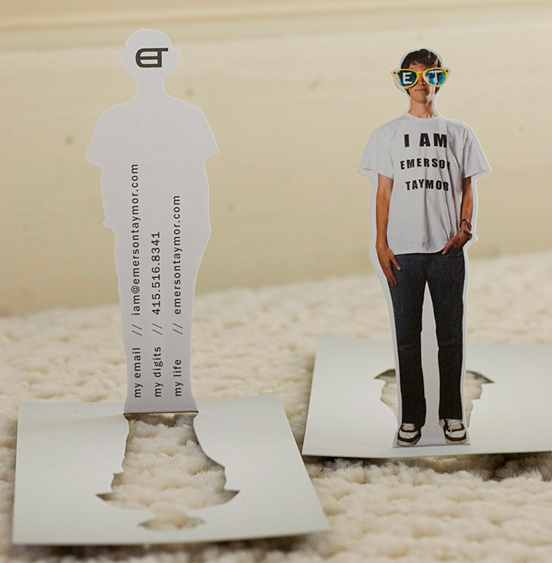 Pop-up and out business card shaped like a person wearing a t-shirt, jeans, and novelty sunglasses.