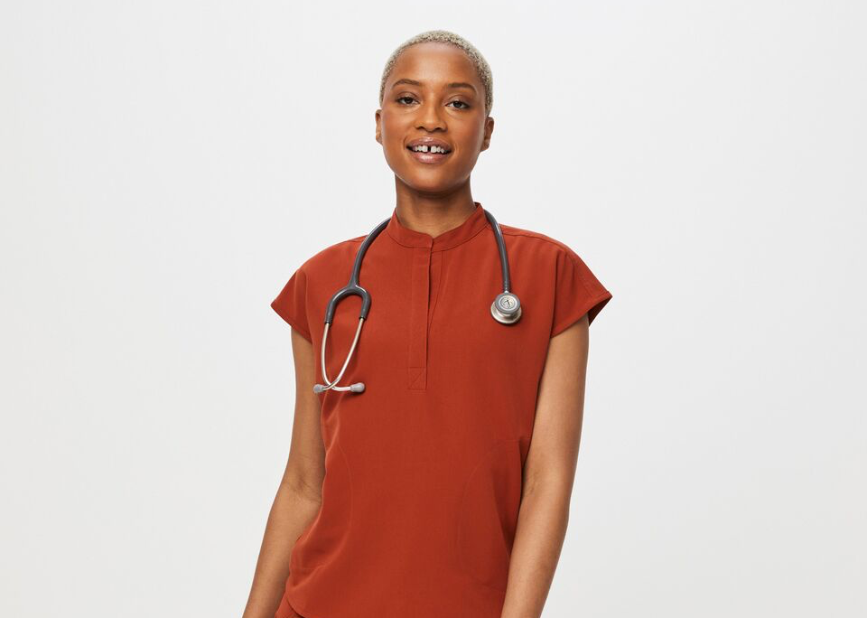 A model wears scrubs by FIGS