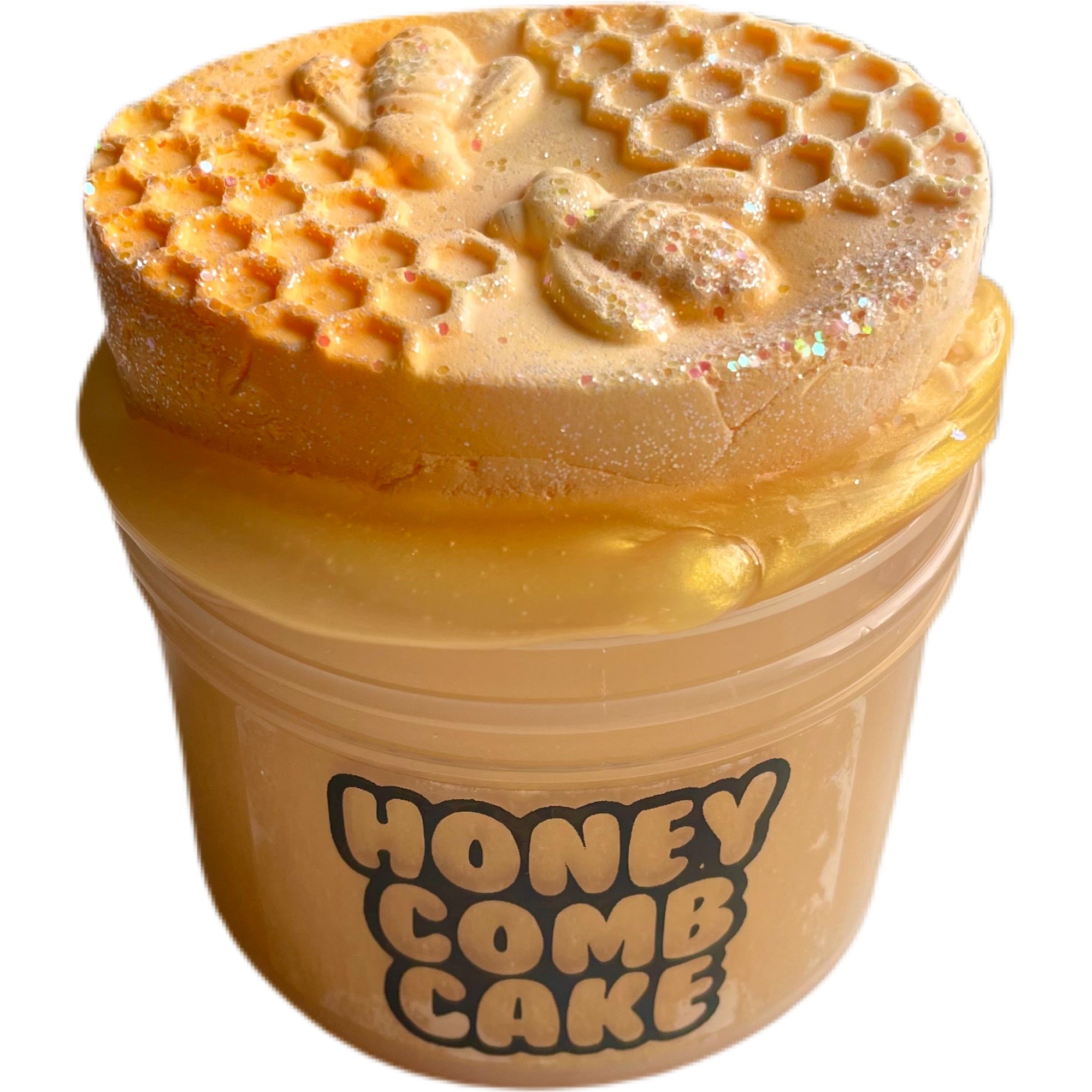 image of yellow slime in a container labelled honey comb cake