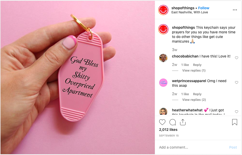 Instagram post of a keychain that says God bless my shitty overpriced apartment
