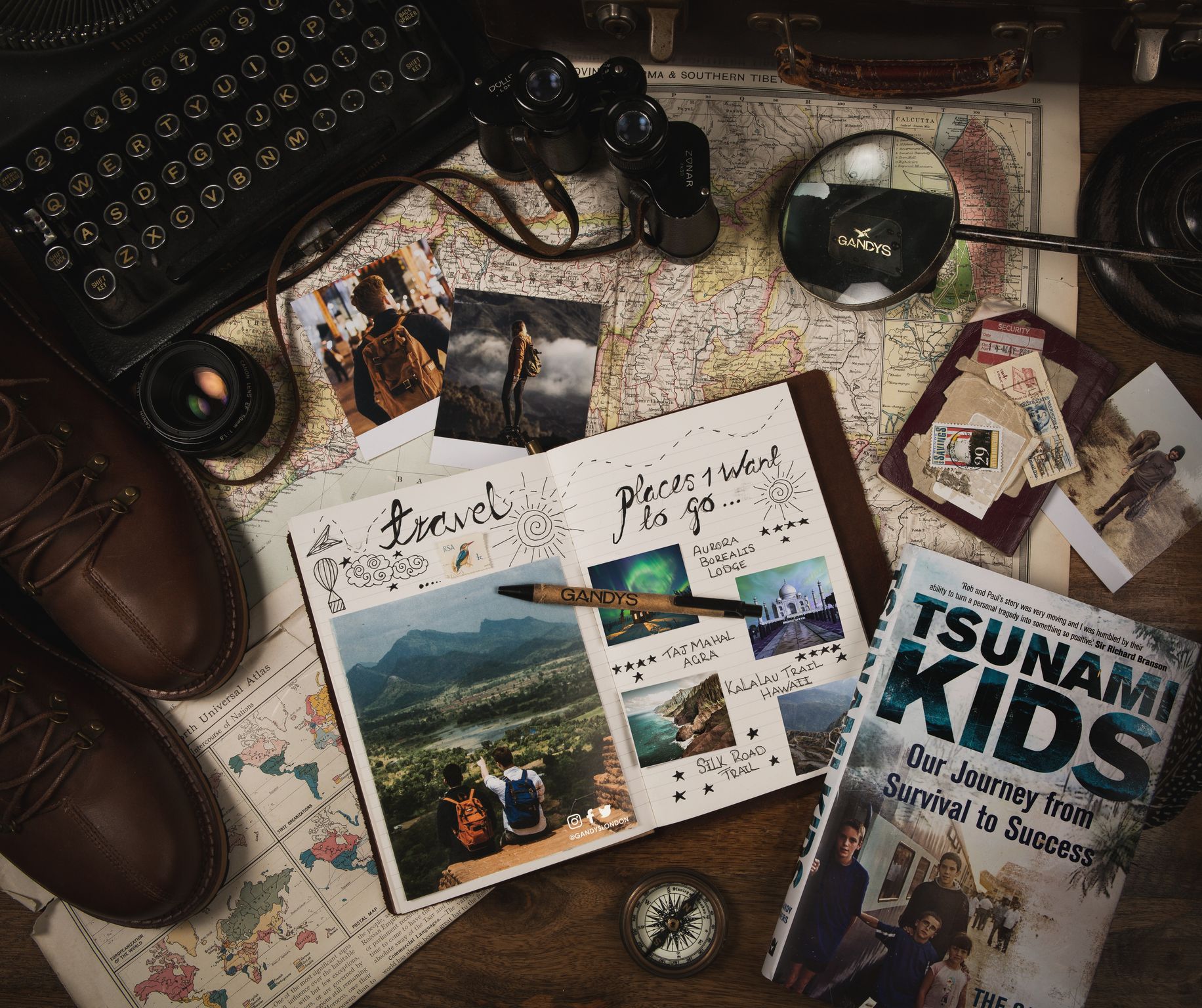 A flatlay featuring a notebook, Paul and Rob’s book along with items from Grandy’s. 