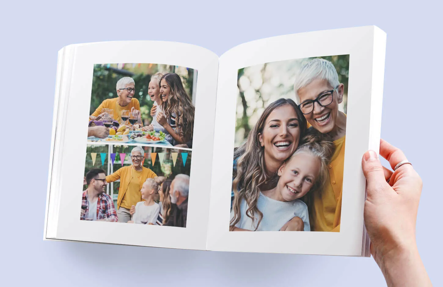 A person holds open a print on demand photobook showing a family garden party.