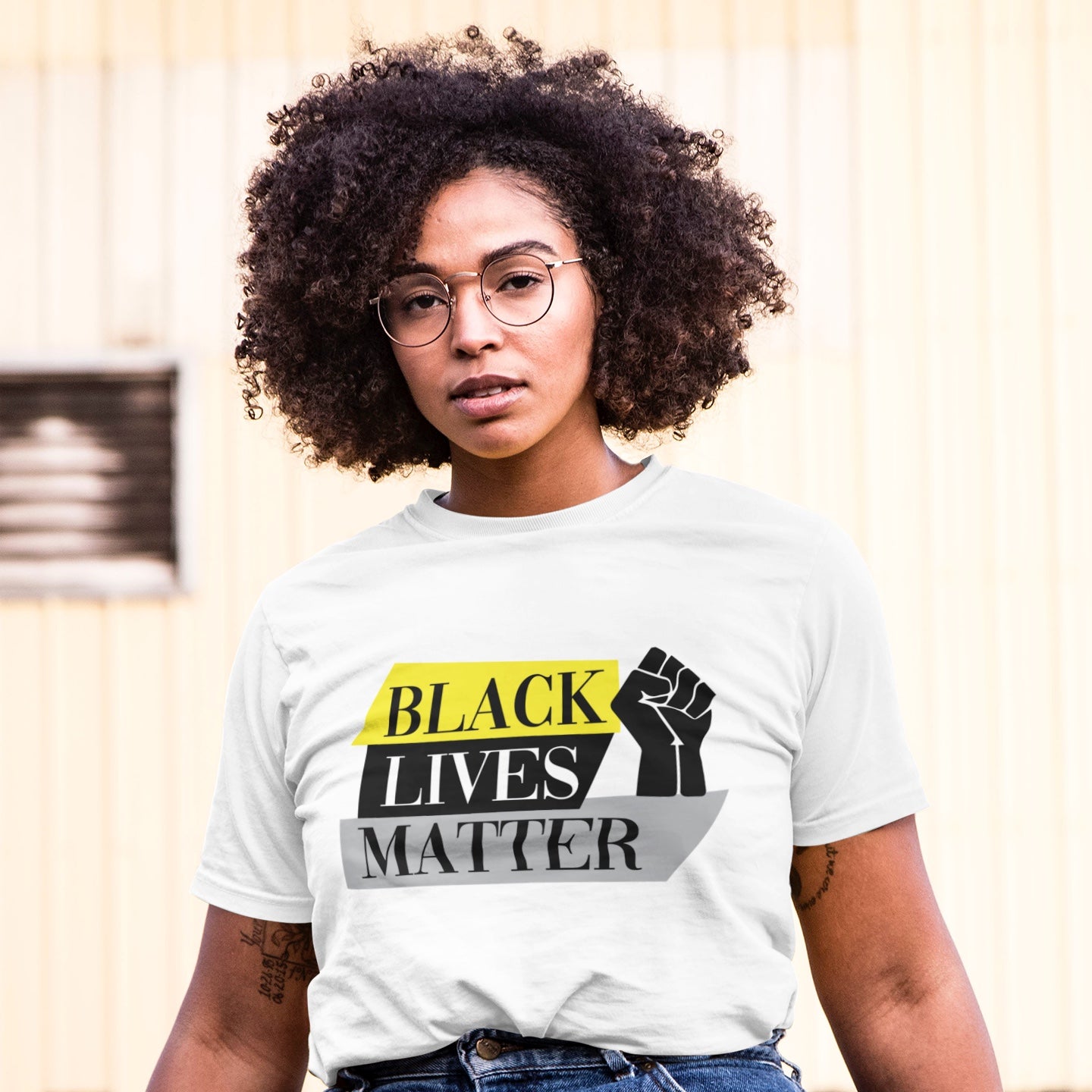 Model wears a t-shirt that reads "Black lives matter"