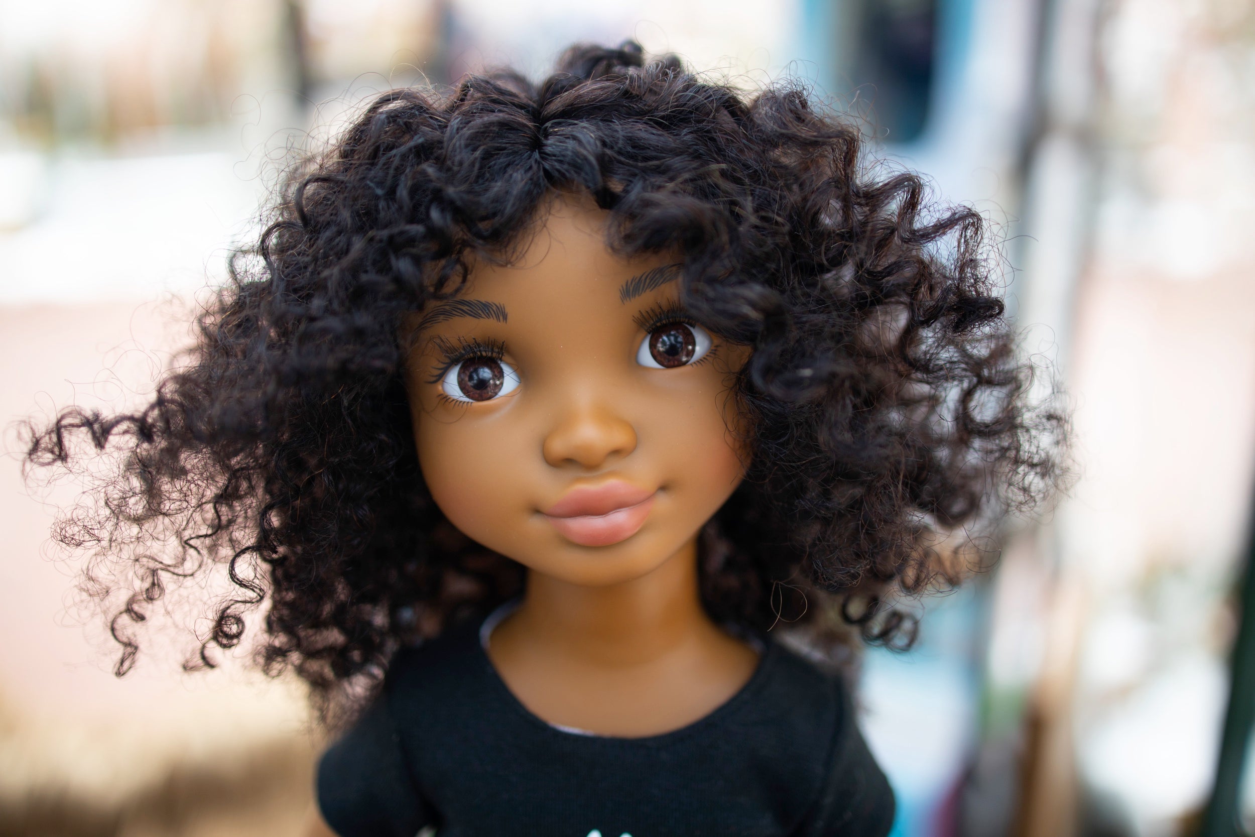 Close up of the face of Zoe by Healthy Roots Dolls