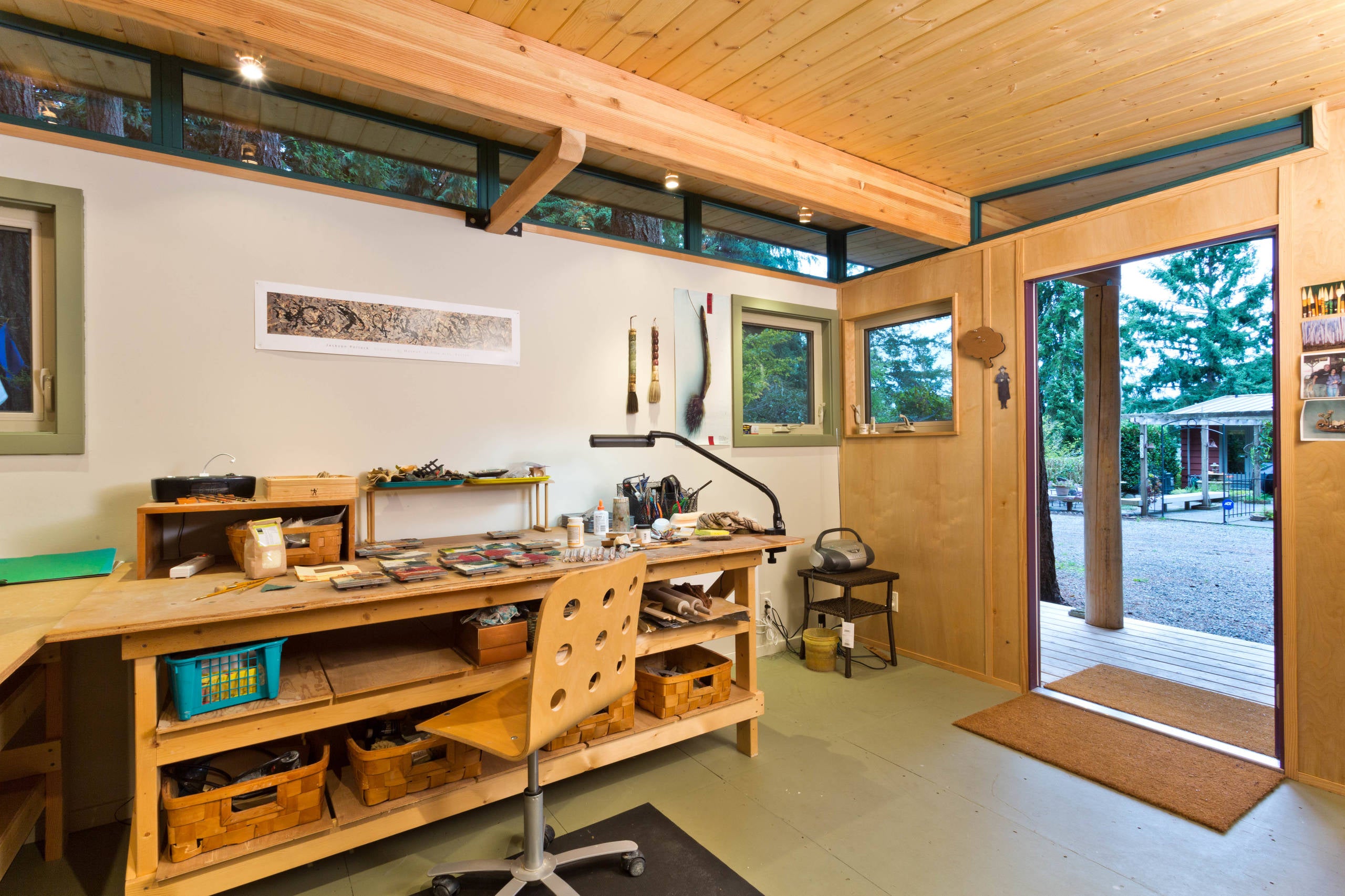 A view of the inside of a workspace that's built into an outdoor shed