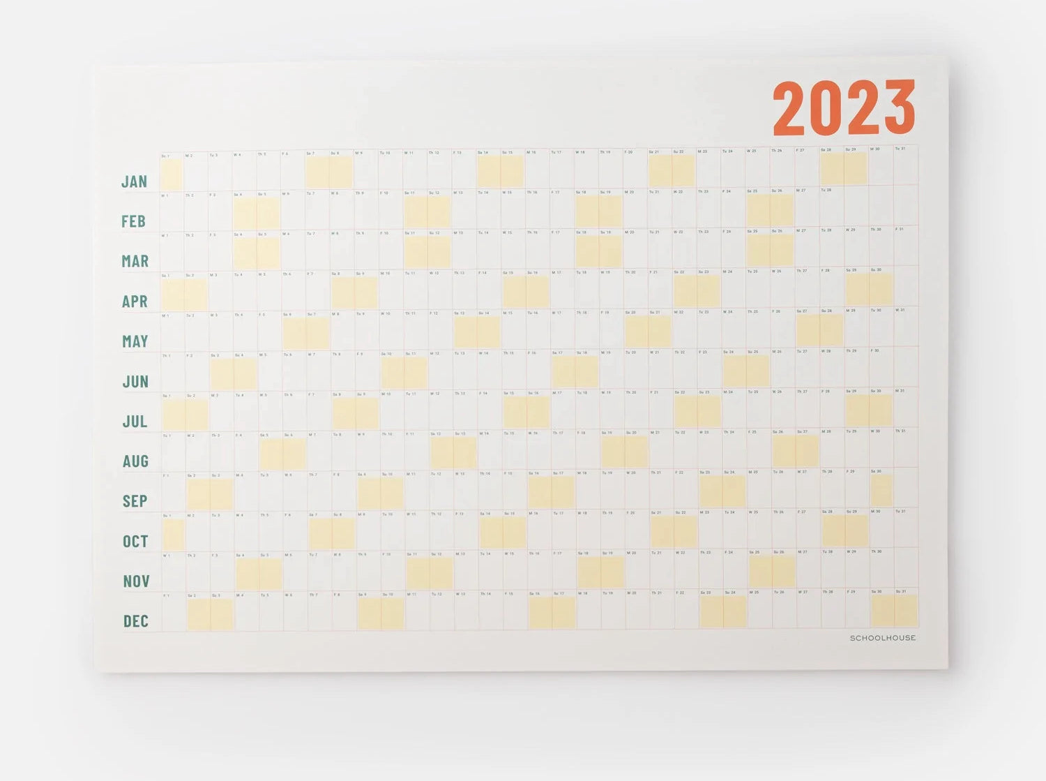 An oversized 2023 paper wall calendar