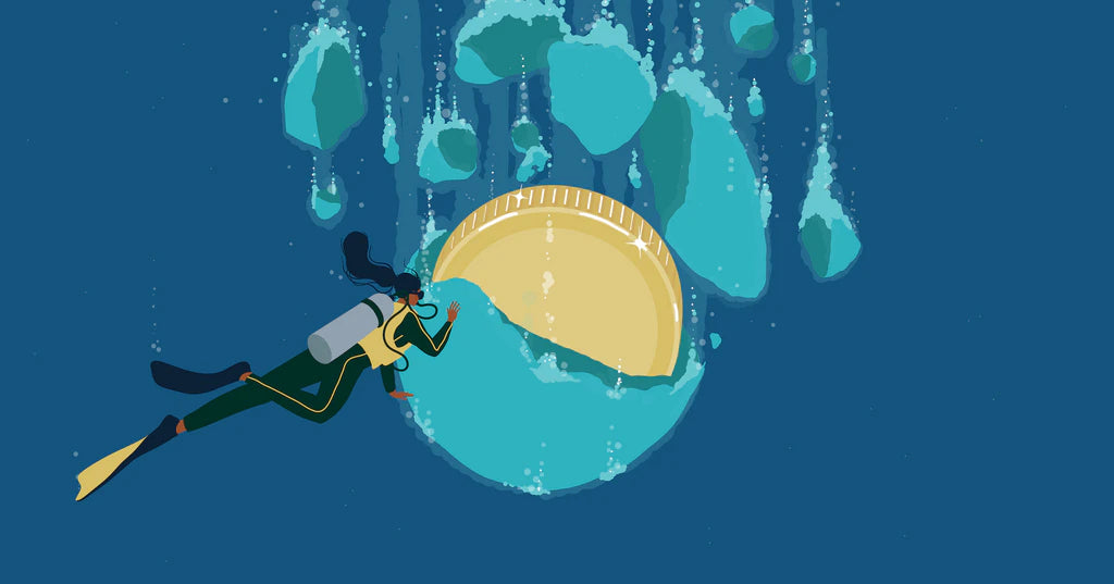 Illustration of a deep sea diver discovering treasure inside an oversized bath bomb