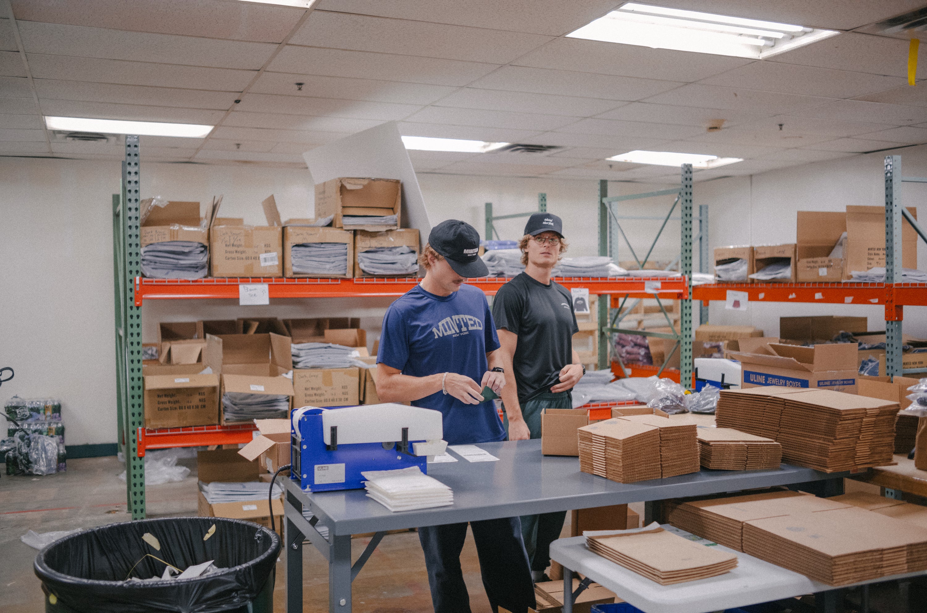 Marcus and his team at the Minted New York warehouse packing boxes.