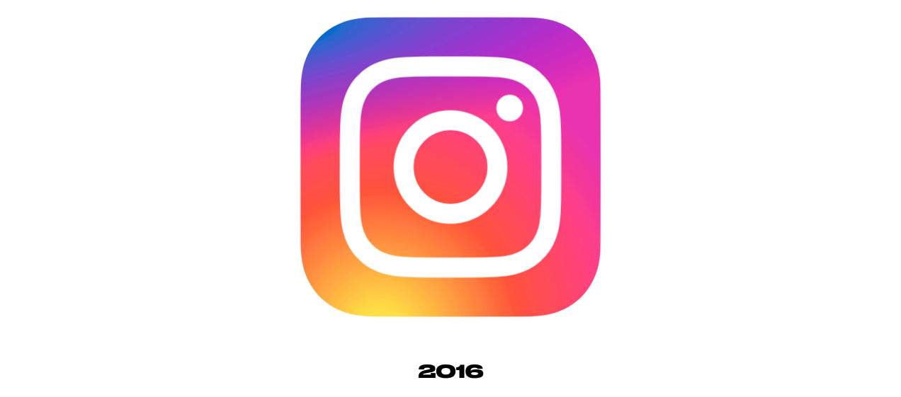 Instagram logo from 2016. The logo is far more minimalist depiction of a camera with just a square, circle and dot outlined in white. The background is a yellow, purple, and fuchsia gradient.