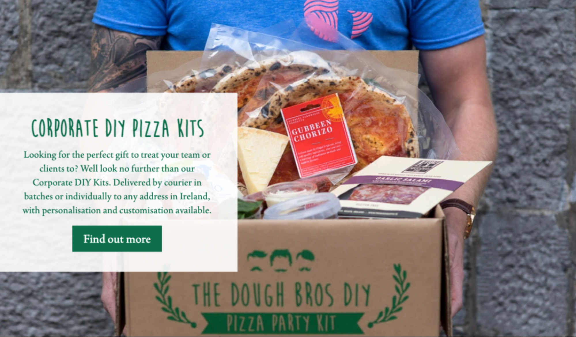 man-holding-dough-bros-gift-basket-with-diy-pizza-kit