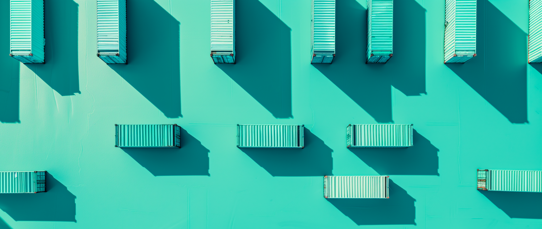An arrangement of cargo containers on a teal background.