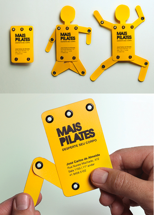 A bright yellow business card shaped like a person with kinetic legs and arms.