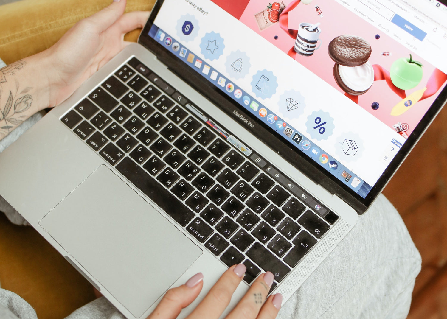 A person types on a laptop open to a marketplace showing how to make money online selling products