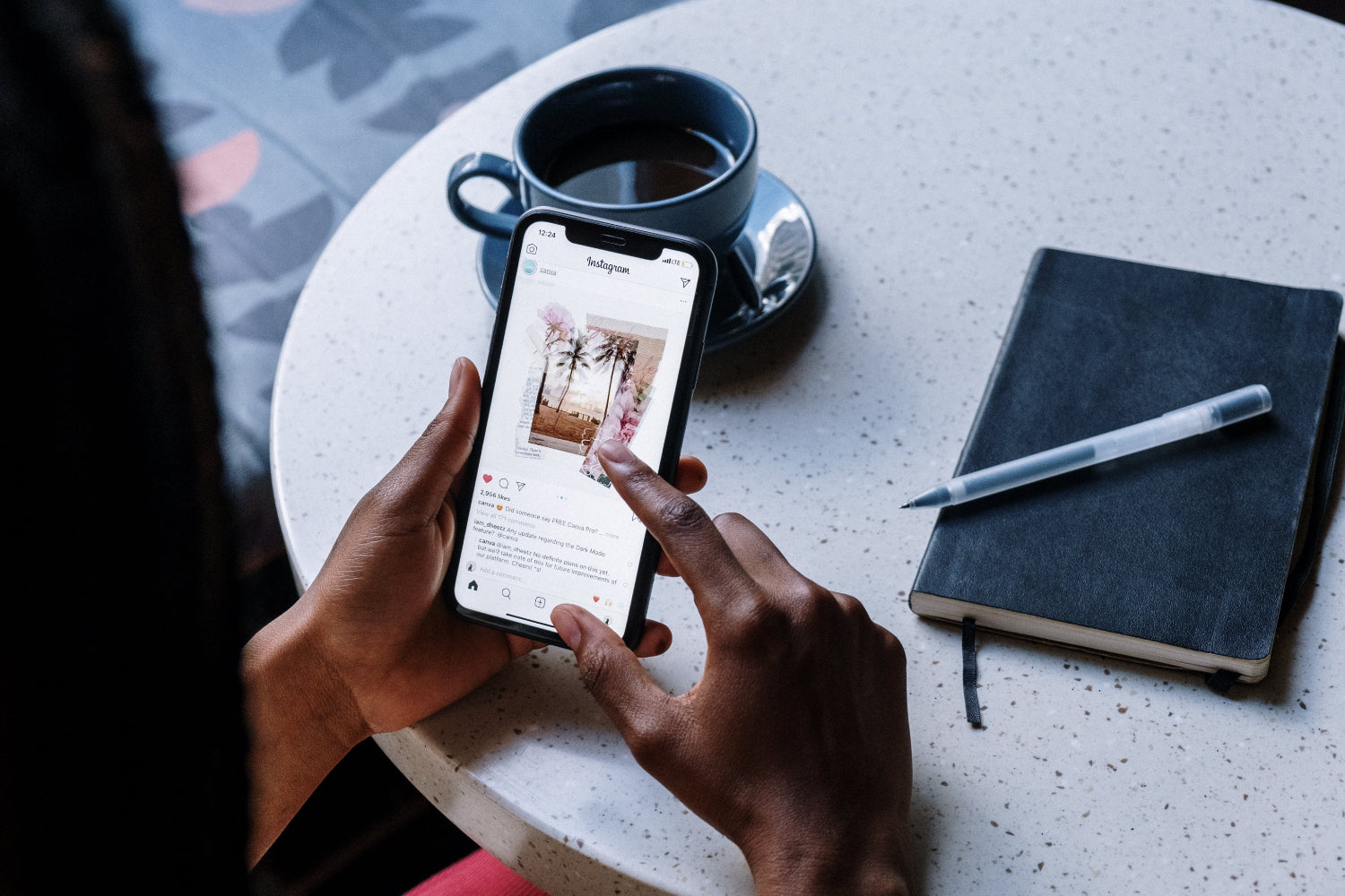 A person browses social media on a mobile phone