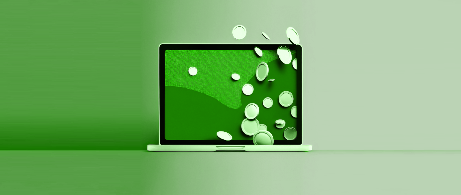 A green laptop with coins on a light and dark green background.