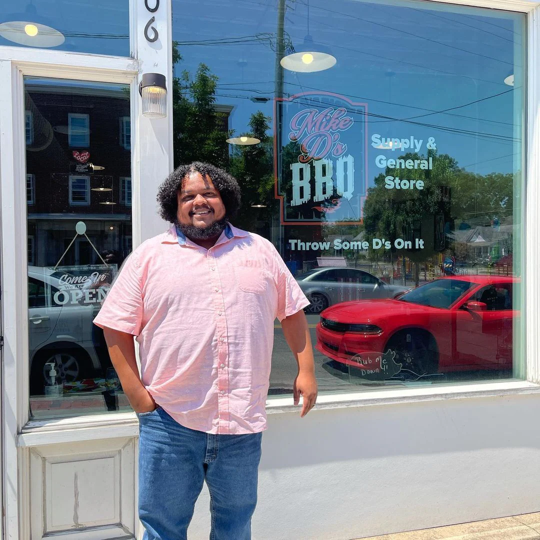 Image of Mike D standing outside his supply and general store