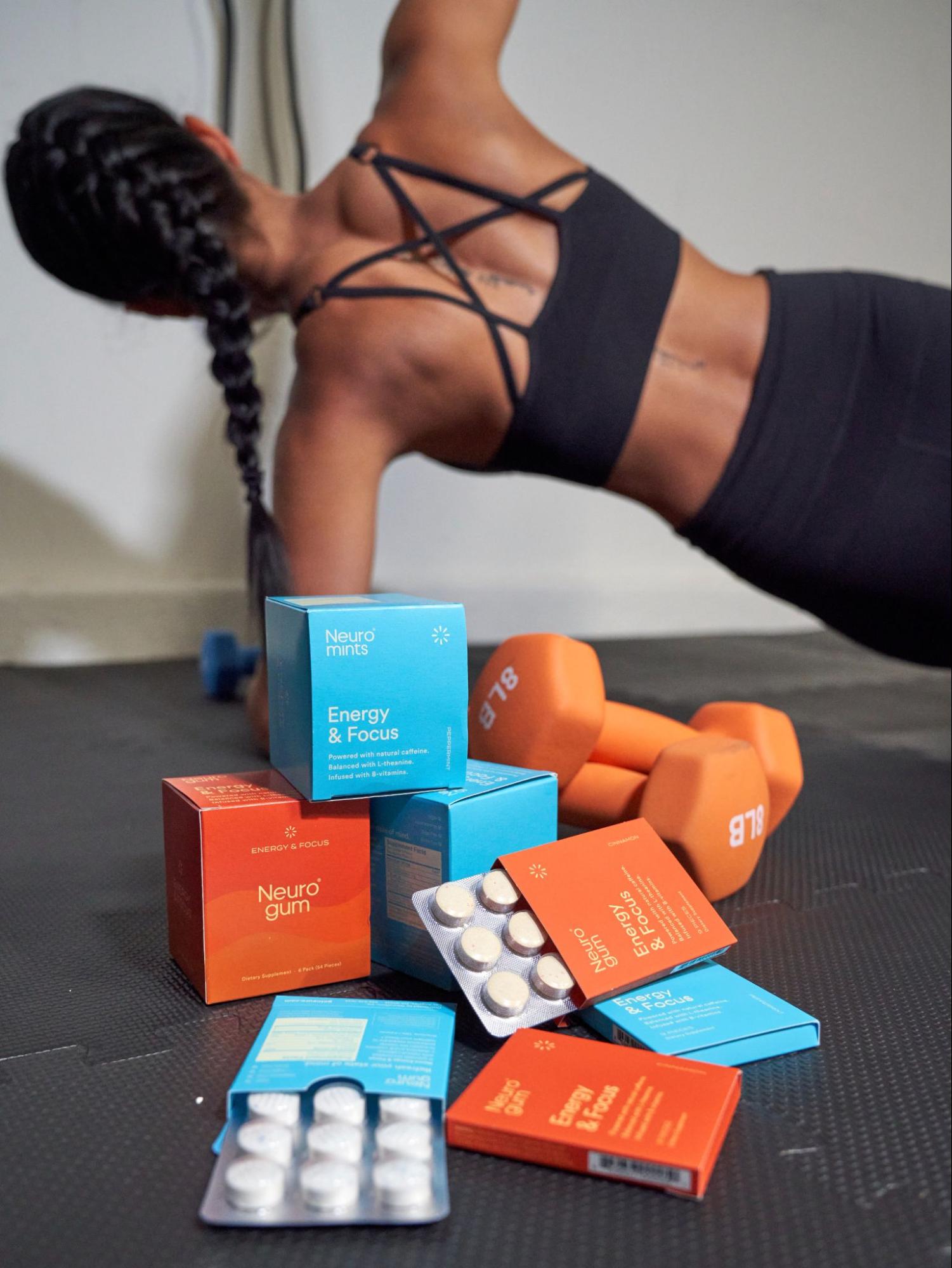 A model working out in the background with Neuro products in the foreground. 