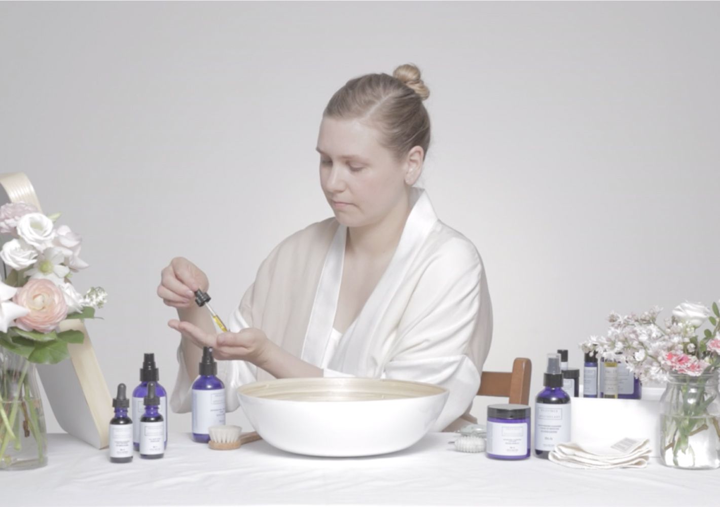 Julie Clarke the founder of Province Apothecary using some of her products to showcase her daily skincare routine. 