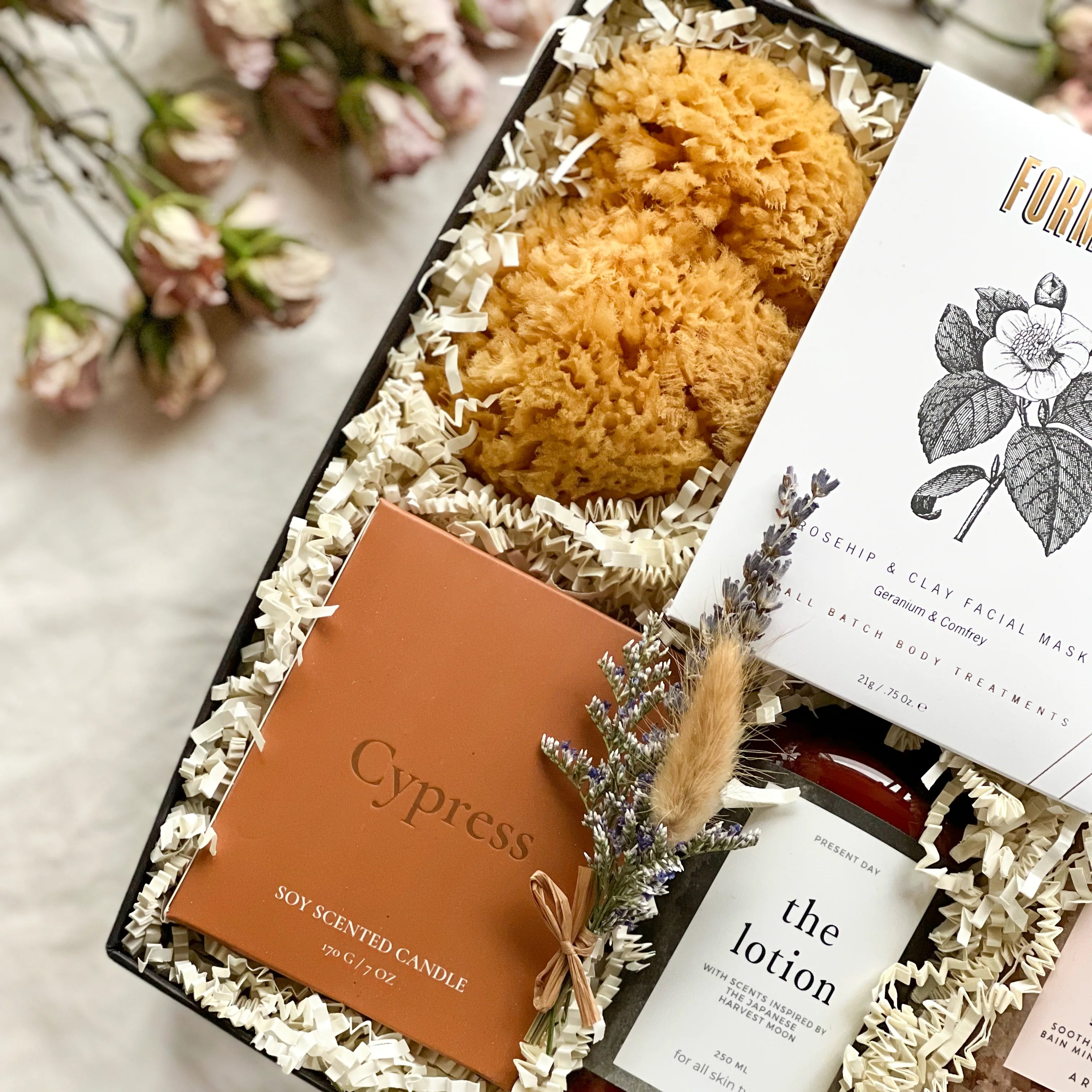 A curated gift box with bath and body products