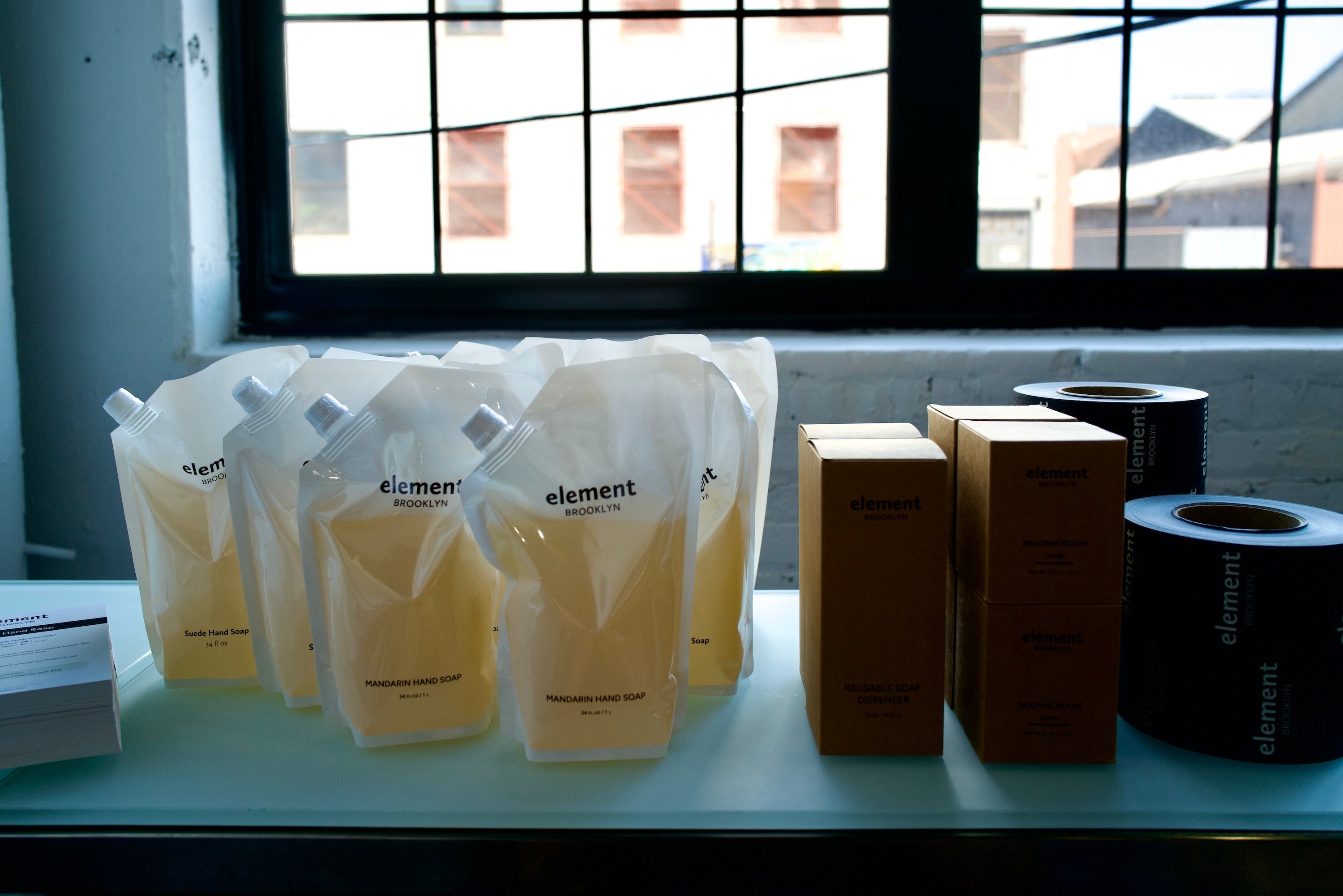  Element Brooklyn's refillable soaps next to packed orders