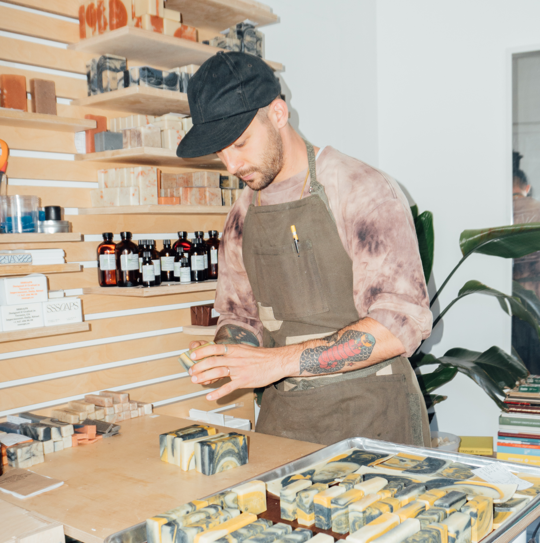 Sandro Petrillo pictured packaging soap in his Toronto-based studio