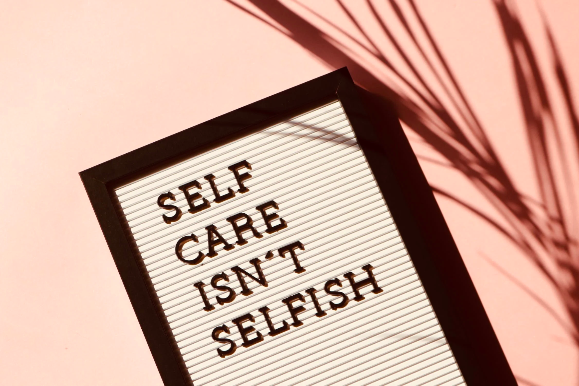 A poster with the slogan “self care isn’t selfish