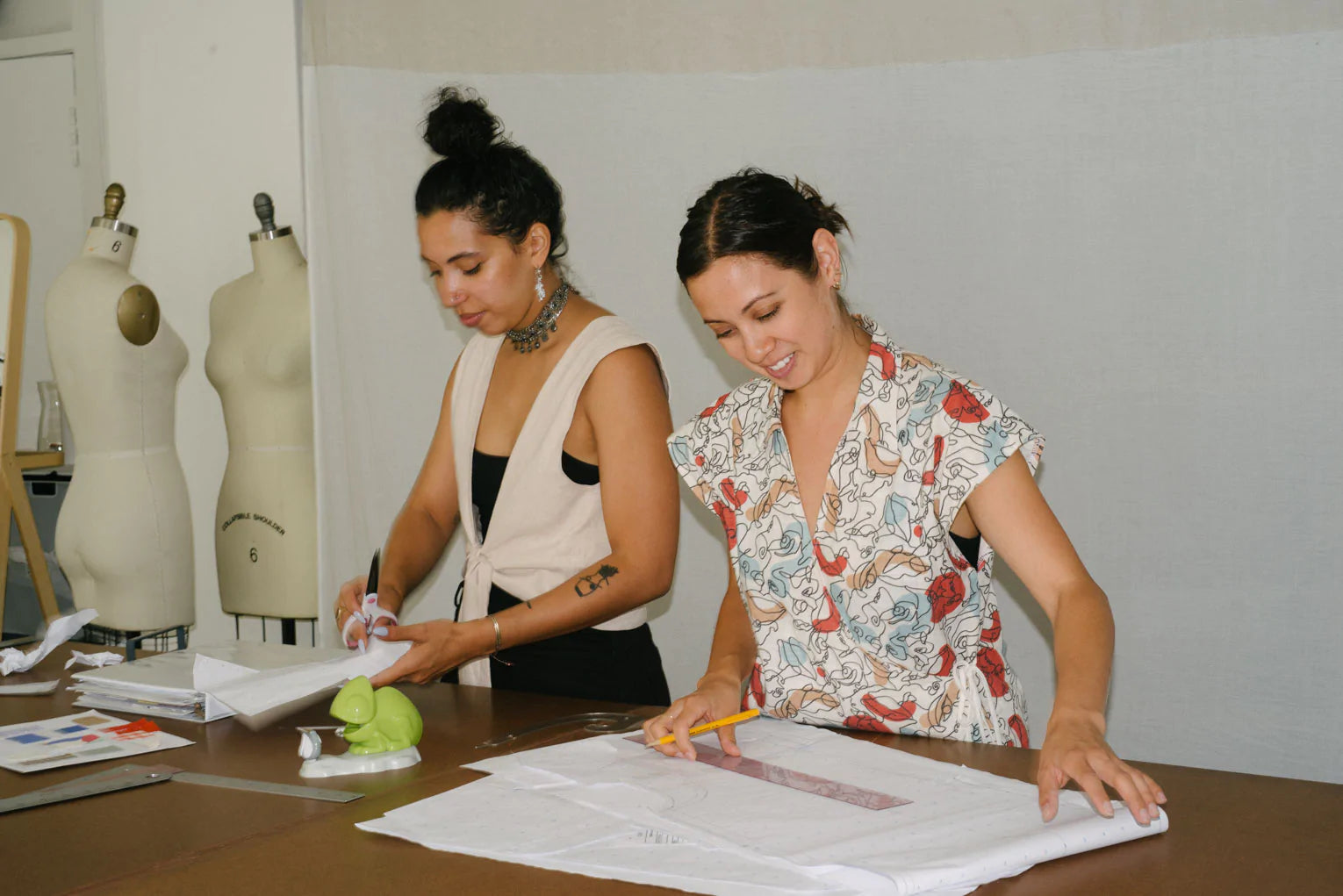 Portrait of the founders of Selva Negra working in a studio