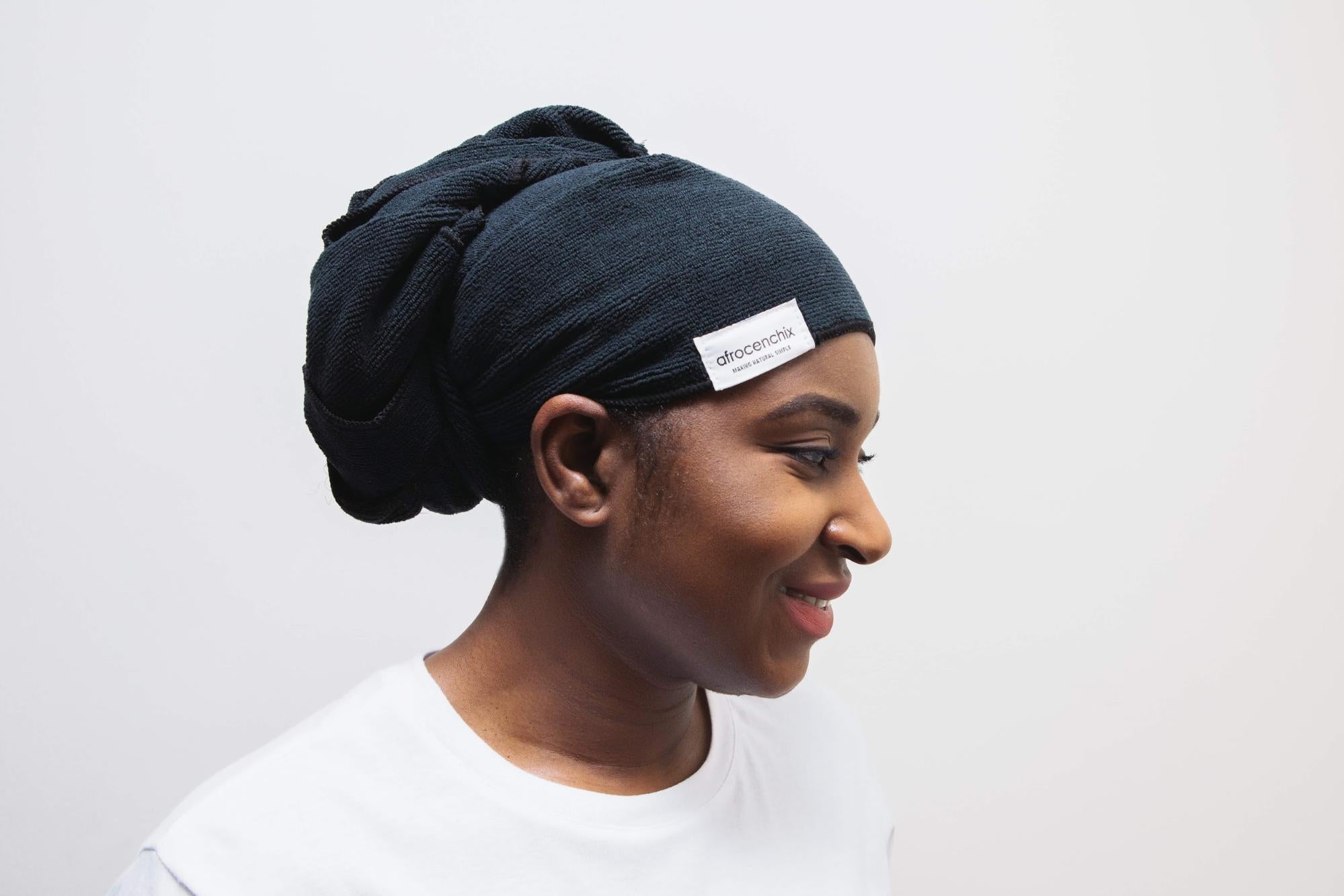 A model wears a microfiber towel turban from Afrocenchix. 