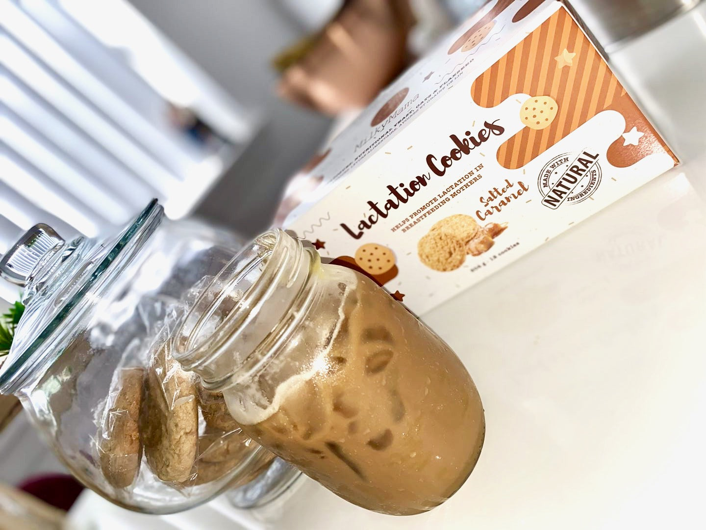 Some lactation cookies by Milky Mama along with a cup of iced coffee.