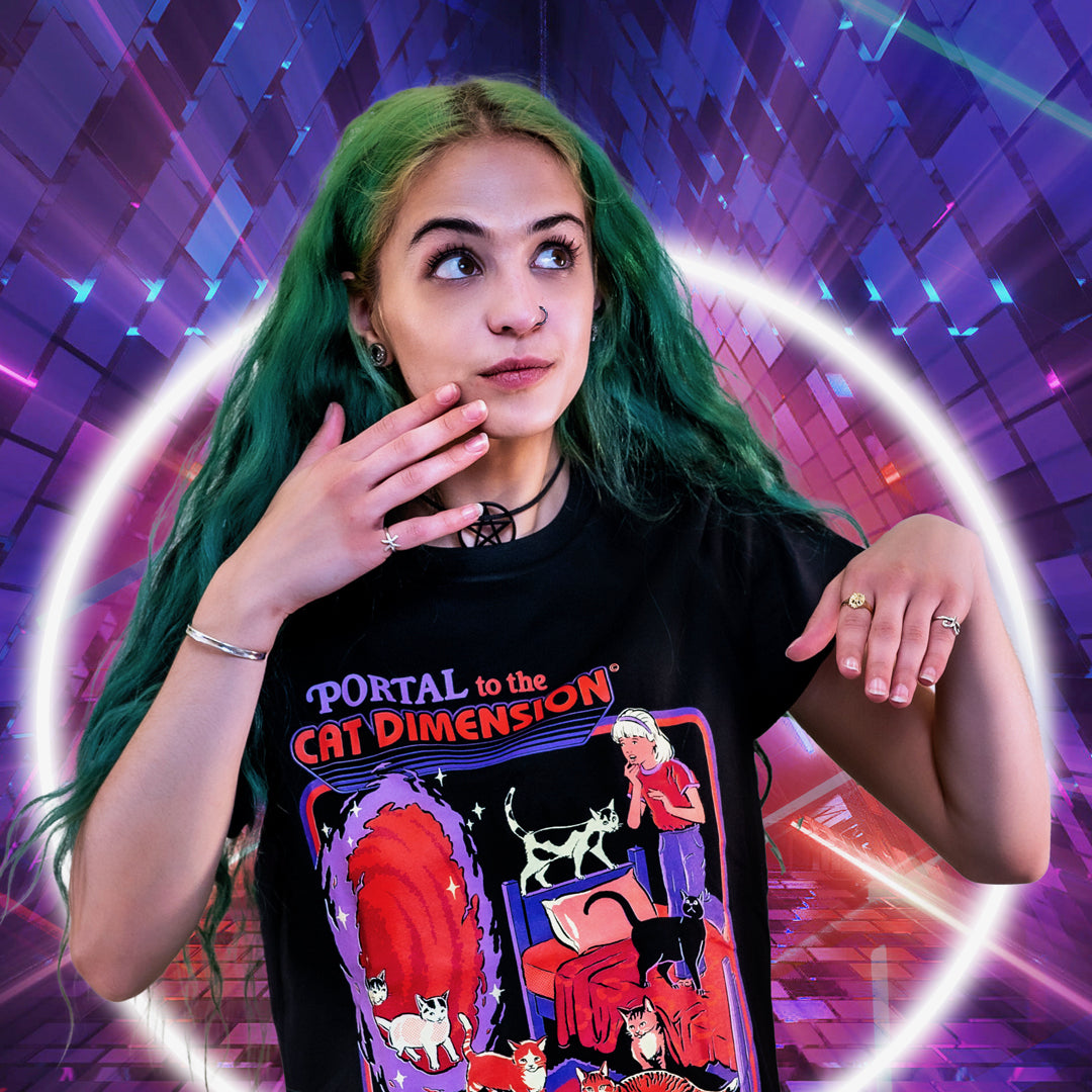 A female model in a graphic t-shirt by Threadheads backdropped by an illustrated purple background. 