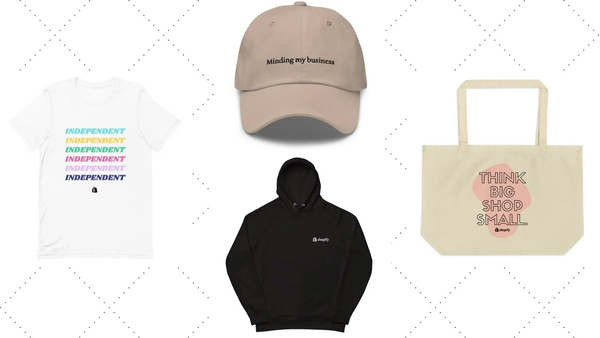 Four types of Shopify merch, a t-shirt, a sweatshirt, a tote bag, and a hat