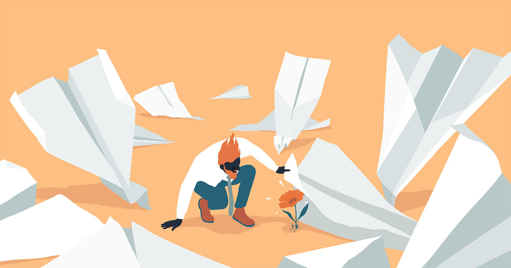Illustration of a character finding a flower under a pile of paper airplanes (representing finding promise among failure)