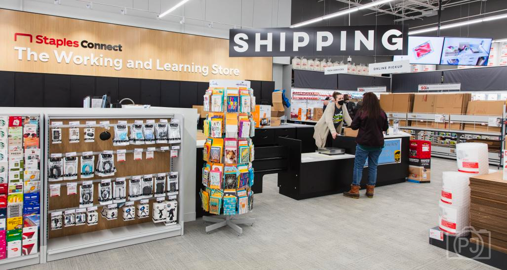 Interior of a Staples store showing a range of products and services as an example of enterprise.