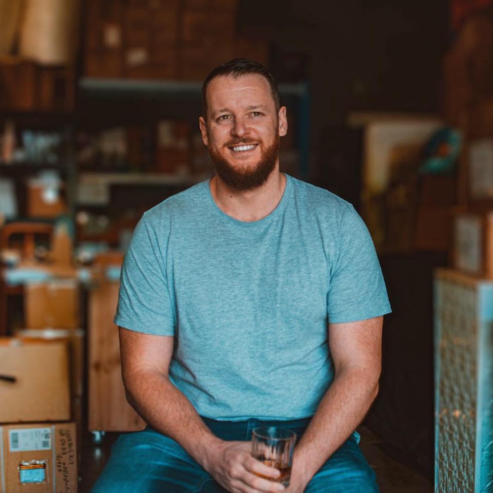 Steve The Bartender holding a cocktail.