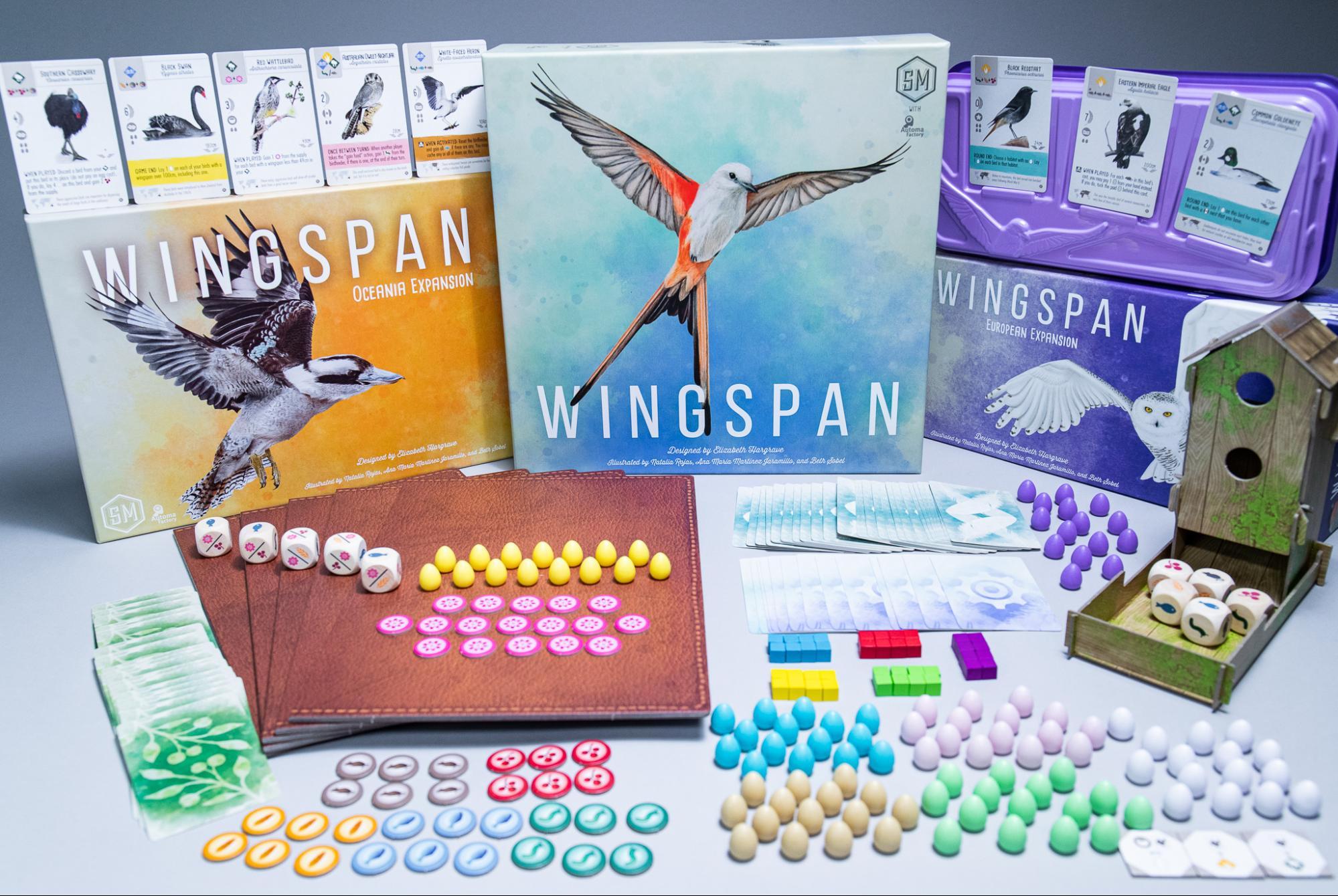 The cult classic board game published by Stonemaier Games called Wingspan along with its expansion packs and game pieces. 