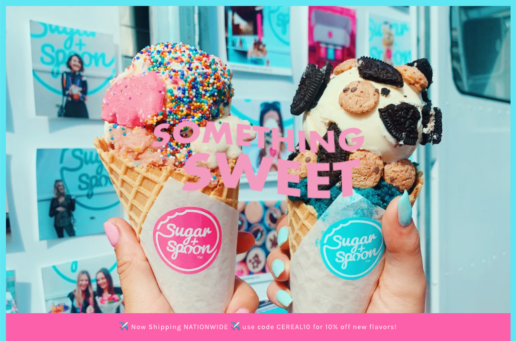 Sugar + Spoon’s ecommerce homepage featuring hands with 2 ice cream cones with signature toppings