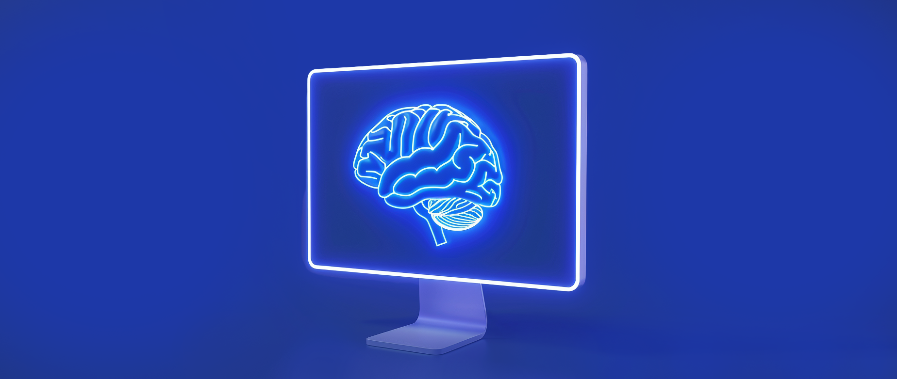 A monitor with an illuminated brain on the screen on a dark blue background.