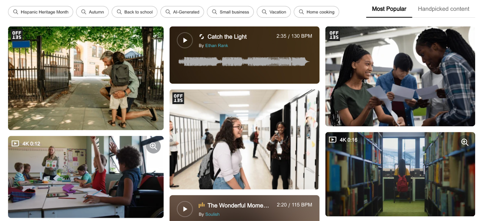 Shutterstock website with assorted videos of people in schools.