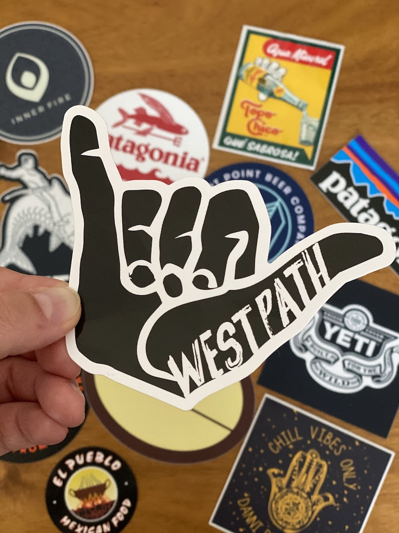 An example of West Path's customer delight method which includes free stickers with orders