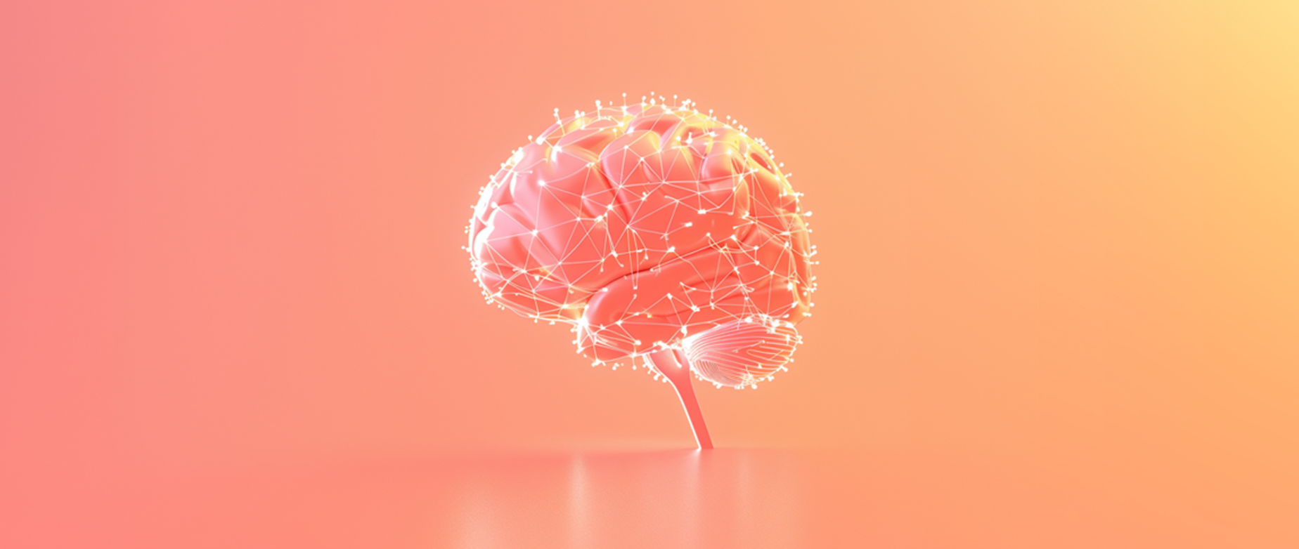 A brain with lit up neuro-pathways on a peach background.