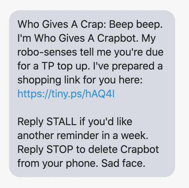 Replenishment reminder text from Who Gives a Crap with a link to top up.