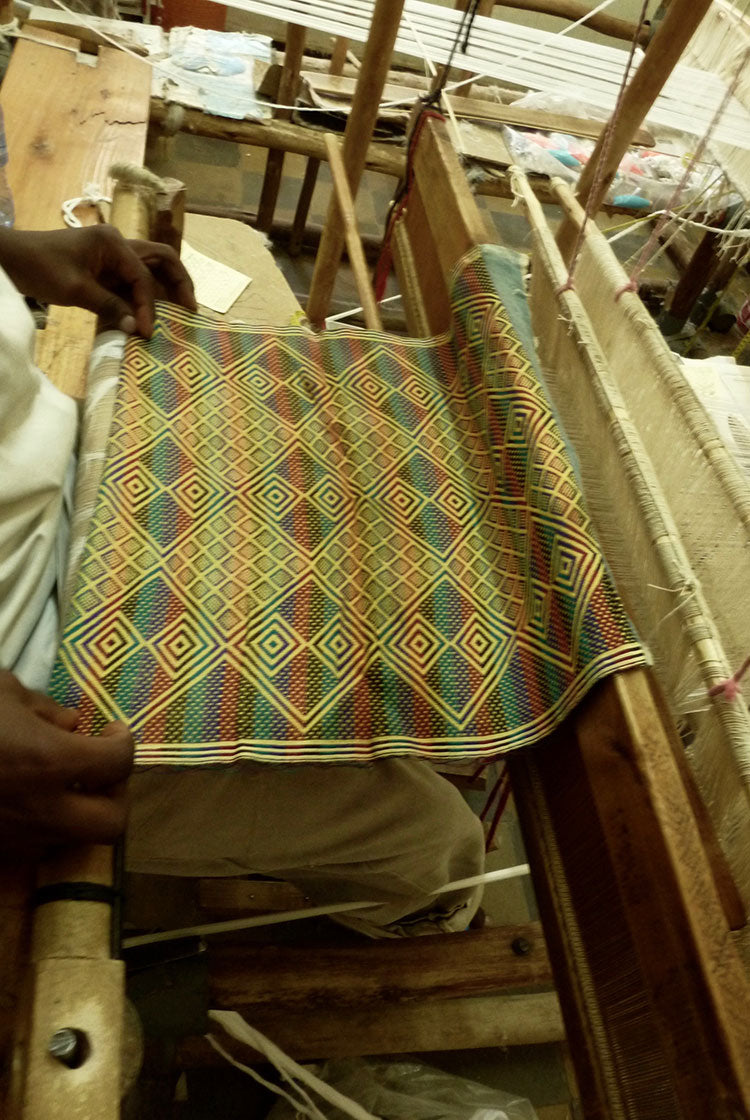 result of the weaving at the weaving table, a geometric pattern fabric
