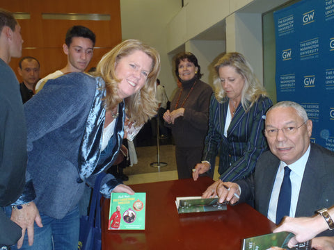 colin-powell-book-signing-rock-your-ugly-christmas-sweater-2012