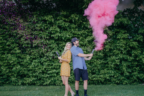 Gender reveal party with powder cannons