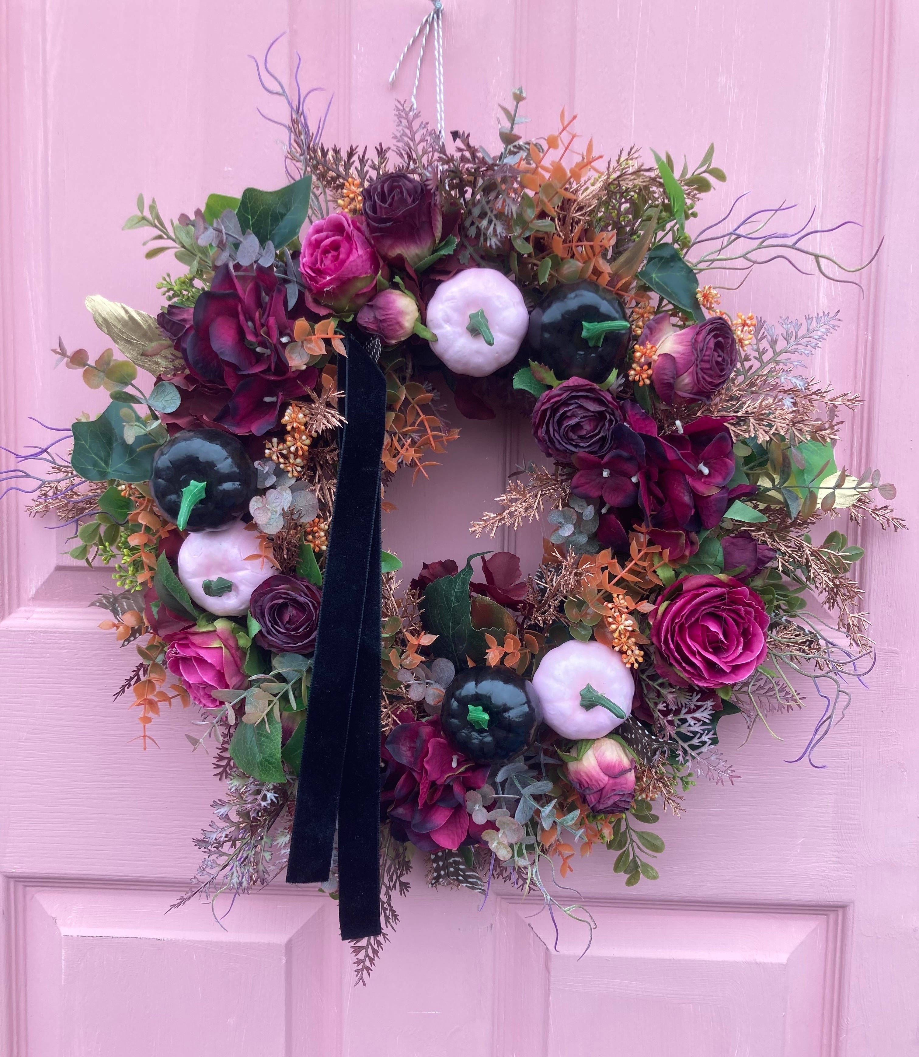 Homemade wreath autumn leaves pumpkins pink black halloween